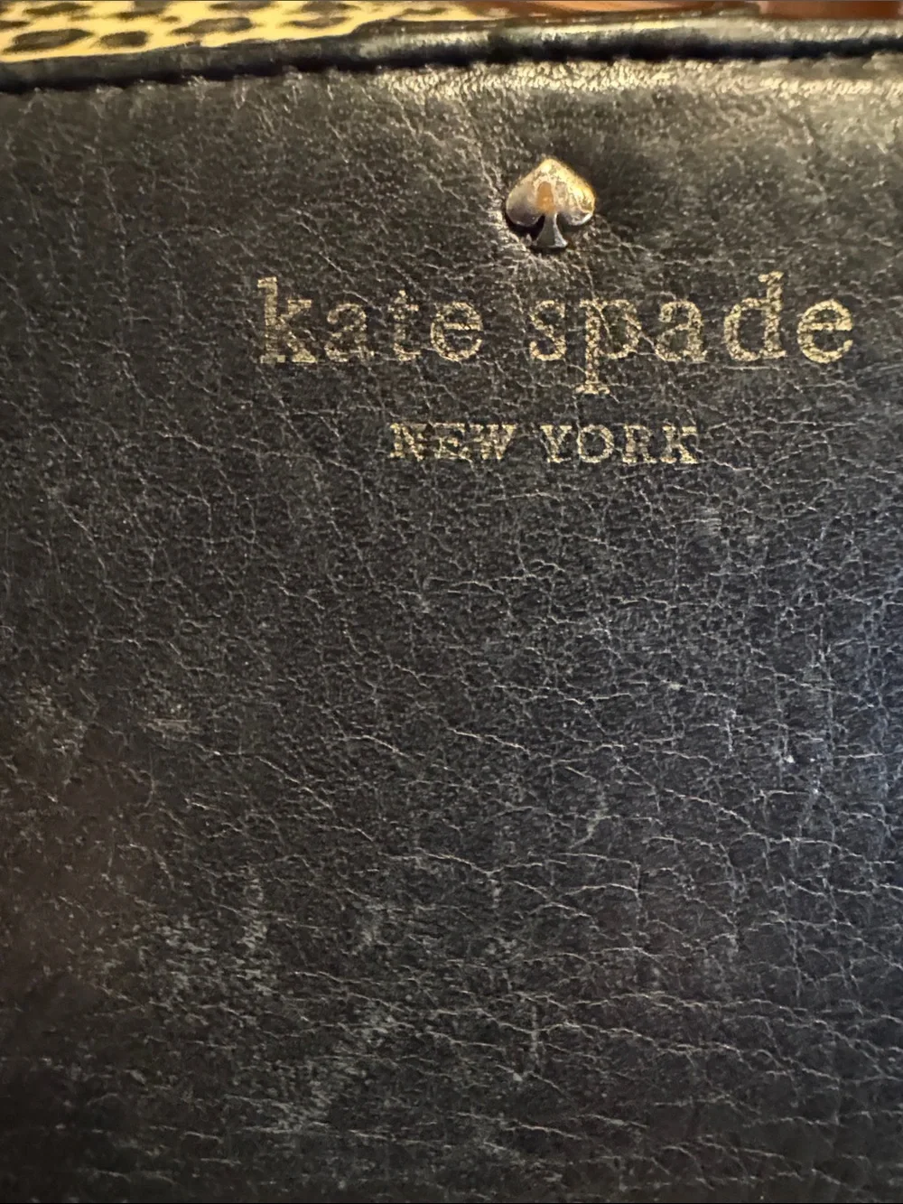 kate spade Black Pebbled Leather Continental Wallet with Gold Logo